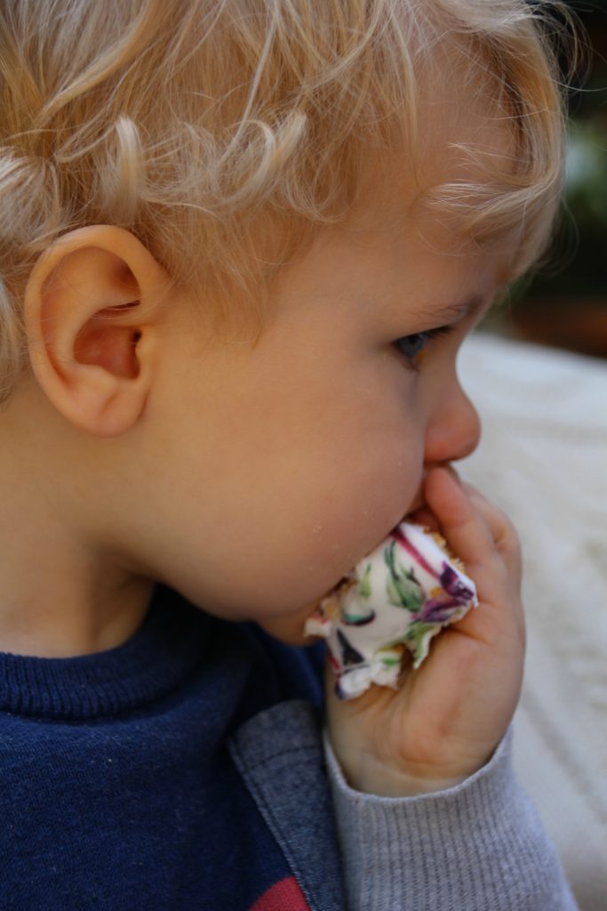 Caspian stuffing his face with cake from Bakerdays.com