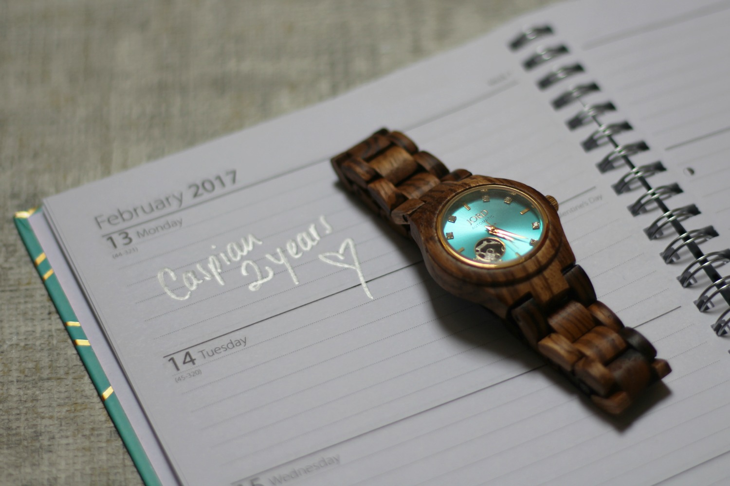 Cora watch from JORD in turquoise and zebra wood