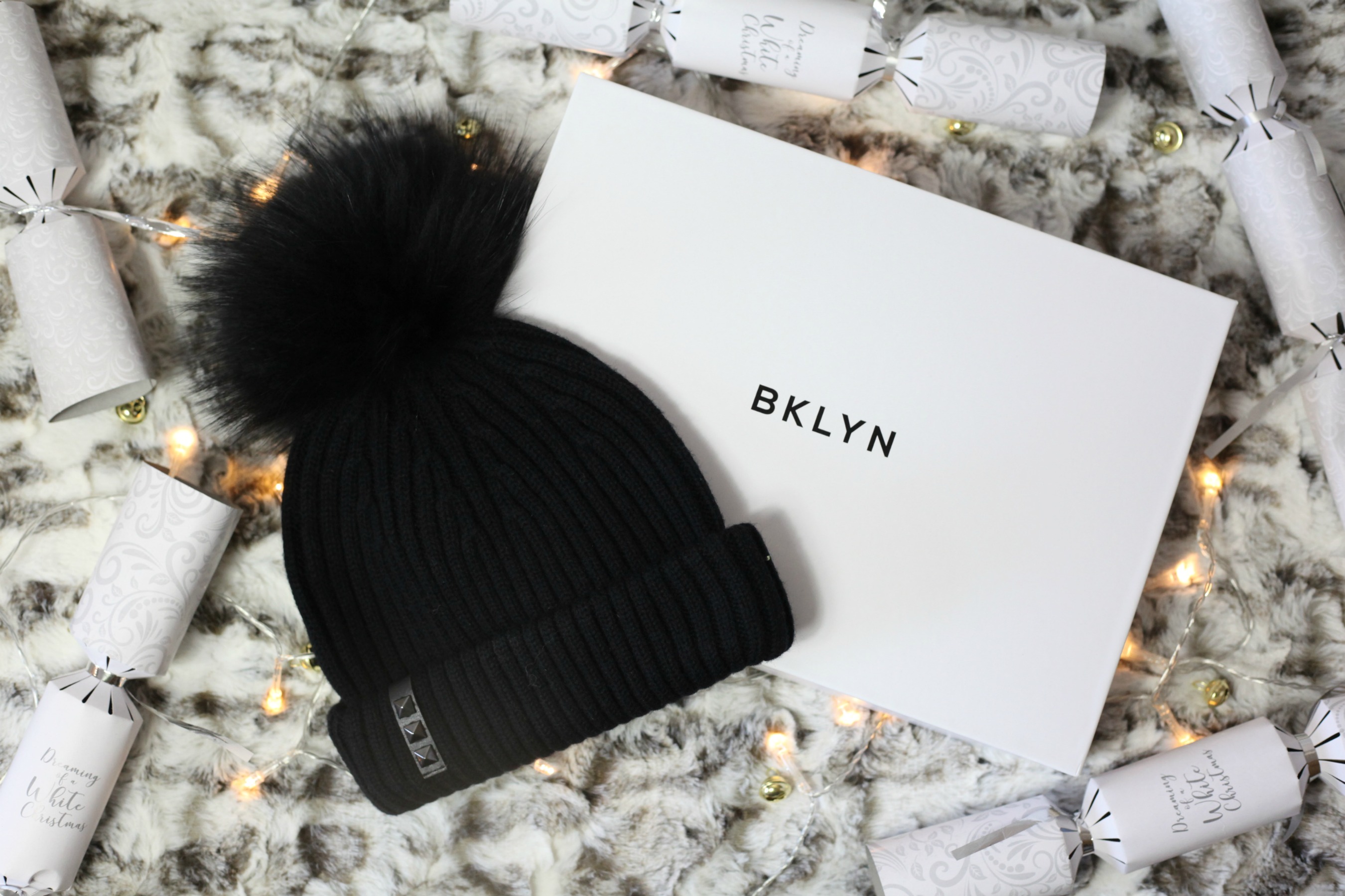 Luxurious Christmas gift ideas from BKLYN like this pom pom hat