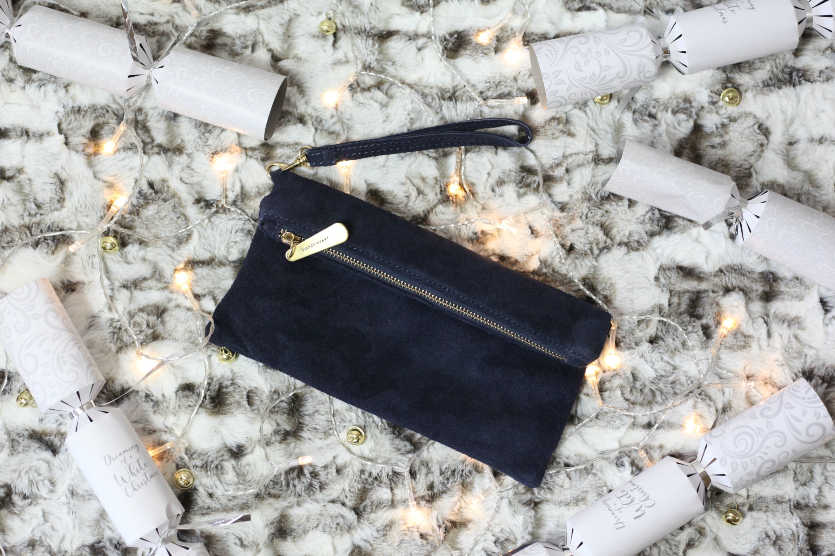 Luxurious Christmas gift ideas from Prezzybox like this personalised suede clutch